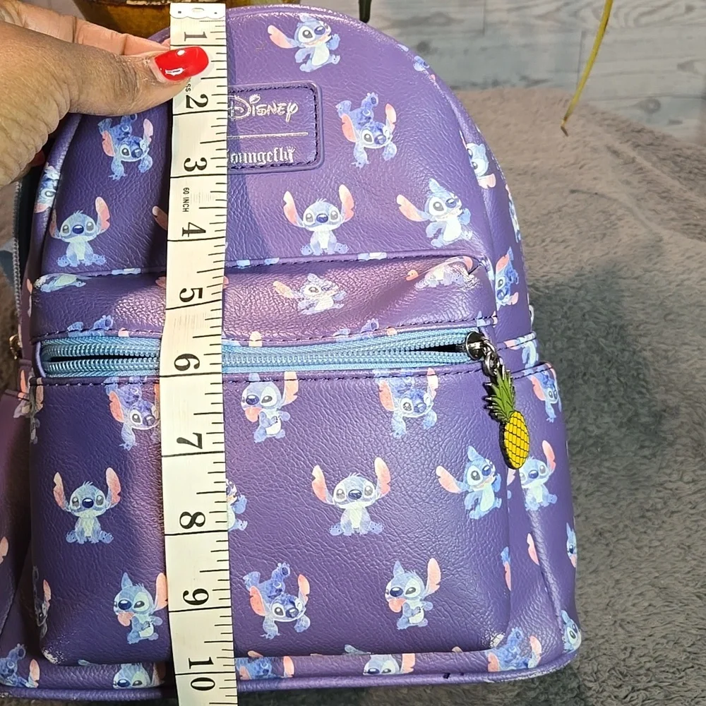Loungefly Disney Lilo & Stitch Poses Mini Backpack Bag With Pineapple Charm